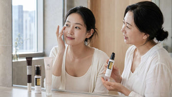 Two South Korean women comparing Korean eye-care products for milia-prone, dry and mature under-eyes
